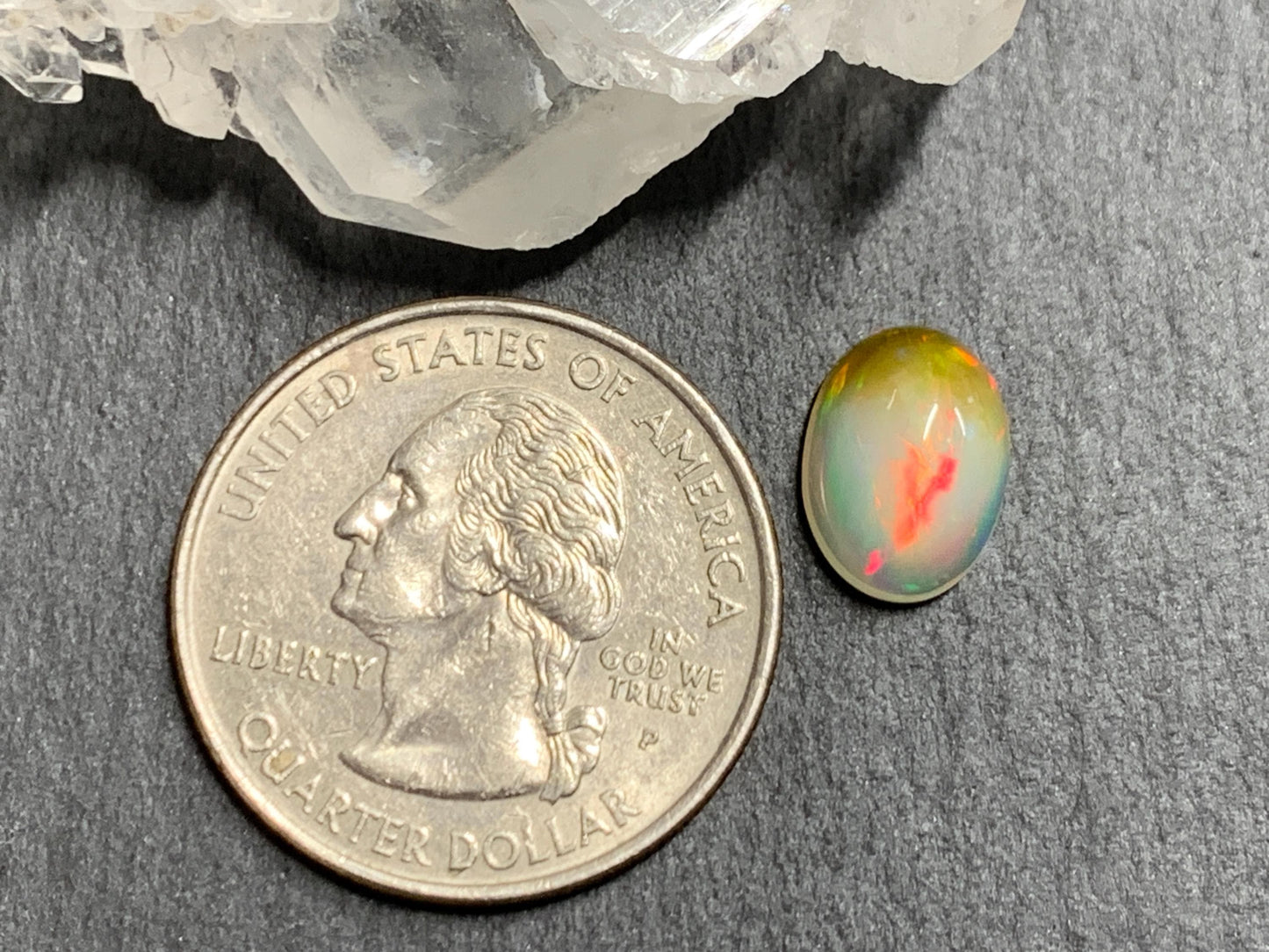 Ethiopian Opal oval 8x11mm cabochon - bi-color Opal