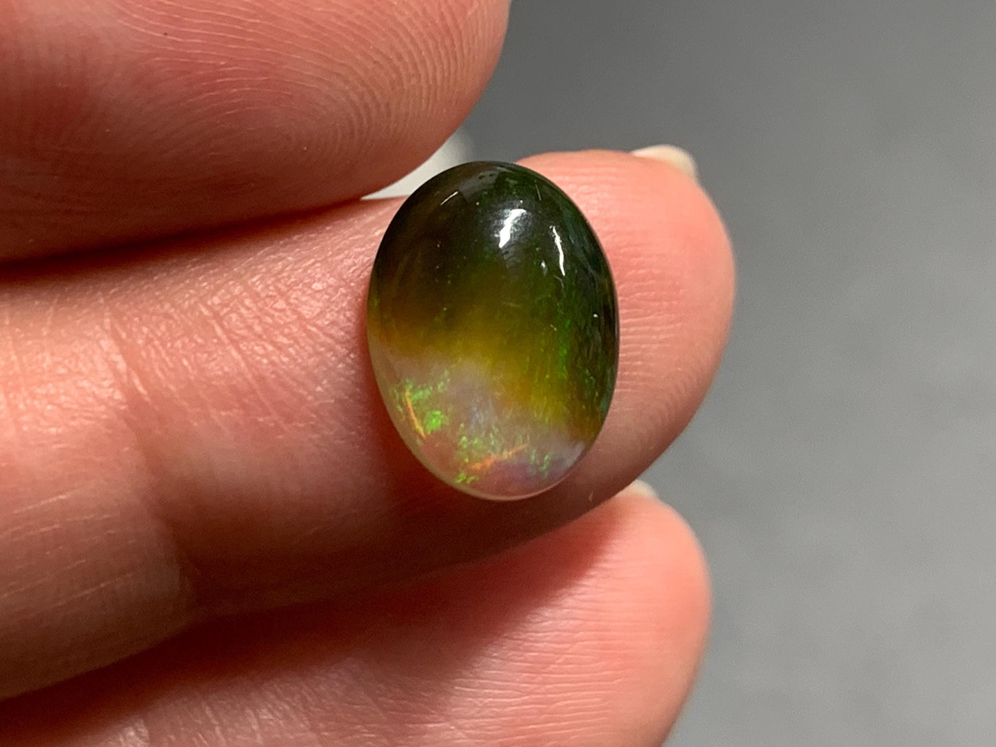 Natural Black Ethiopian Opal oval 9x11x4mm cabochon