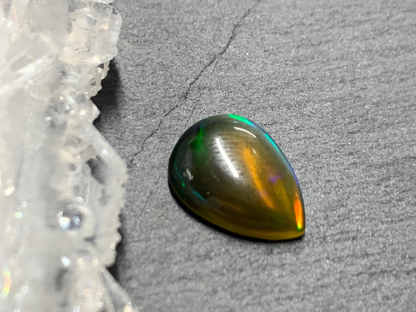 Natural Black Ethiopian Opal pear 9x12x3mm cabochon