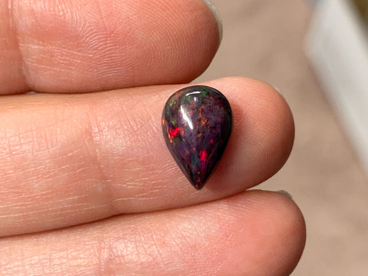 Black Ethiopian Opal pear 8x11x4mm cabochon