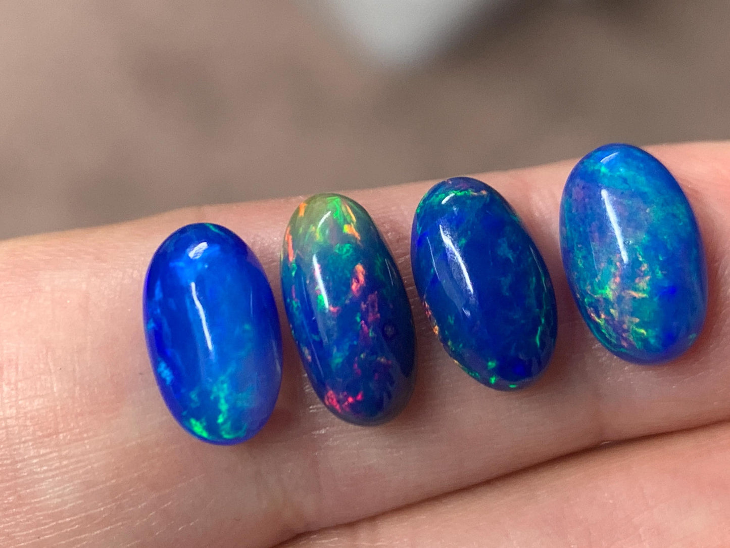 Ethiopian Opal oval 11-12mm long cabochon - Natural Opal smoked to blue color