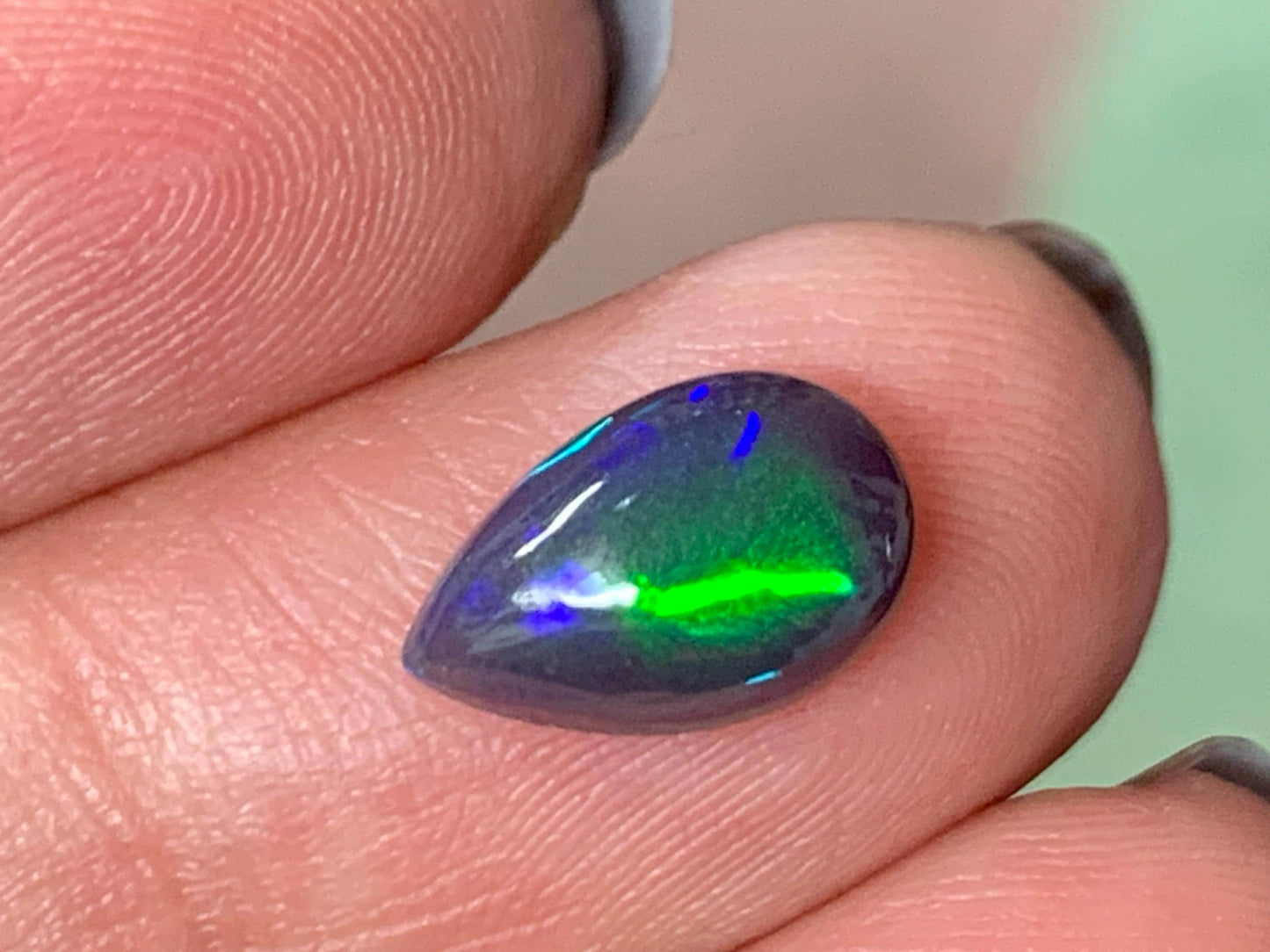 Natural Ethiopian Black Opal 7x11x4mm cabochon