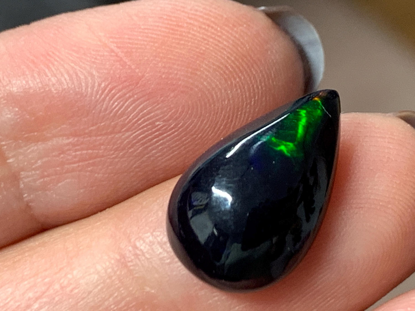Natural Ethiopian Black Opal 10x16x5mm cabochon