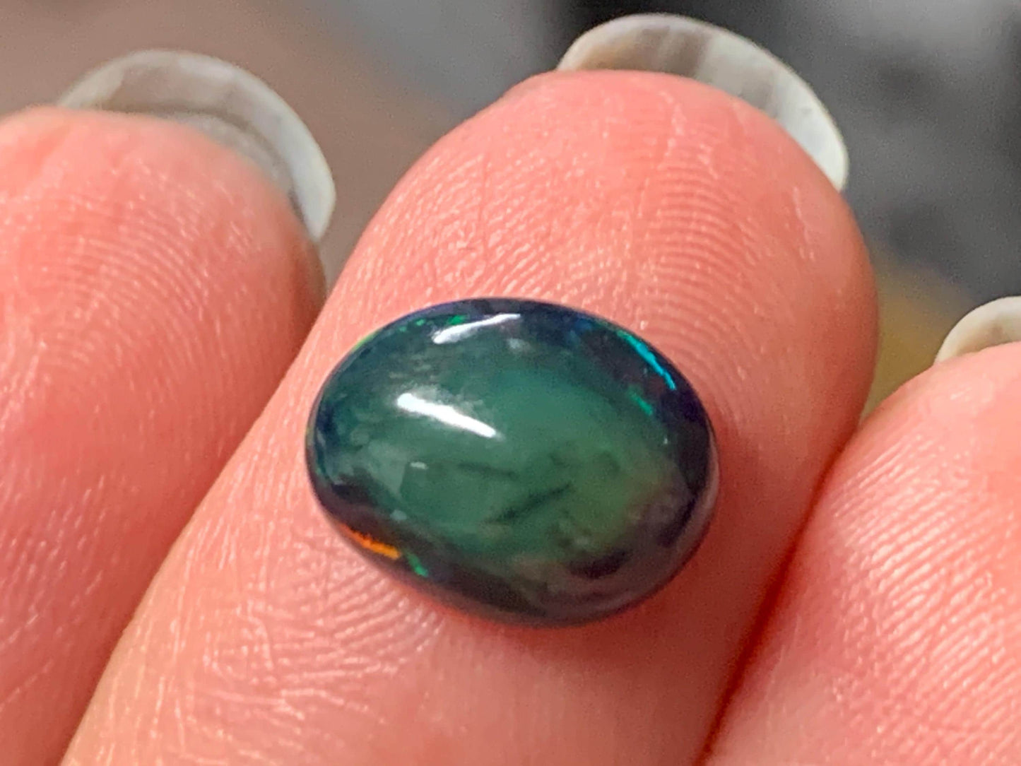 Natural Ethiopian Black Opal 8x10x4mm cabochon
