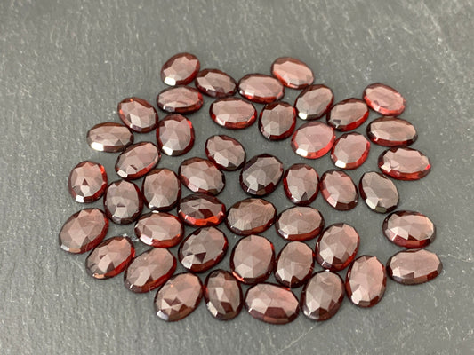 Faceted Mozambique Garnet 8-9.5mm long oval Cabochon