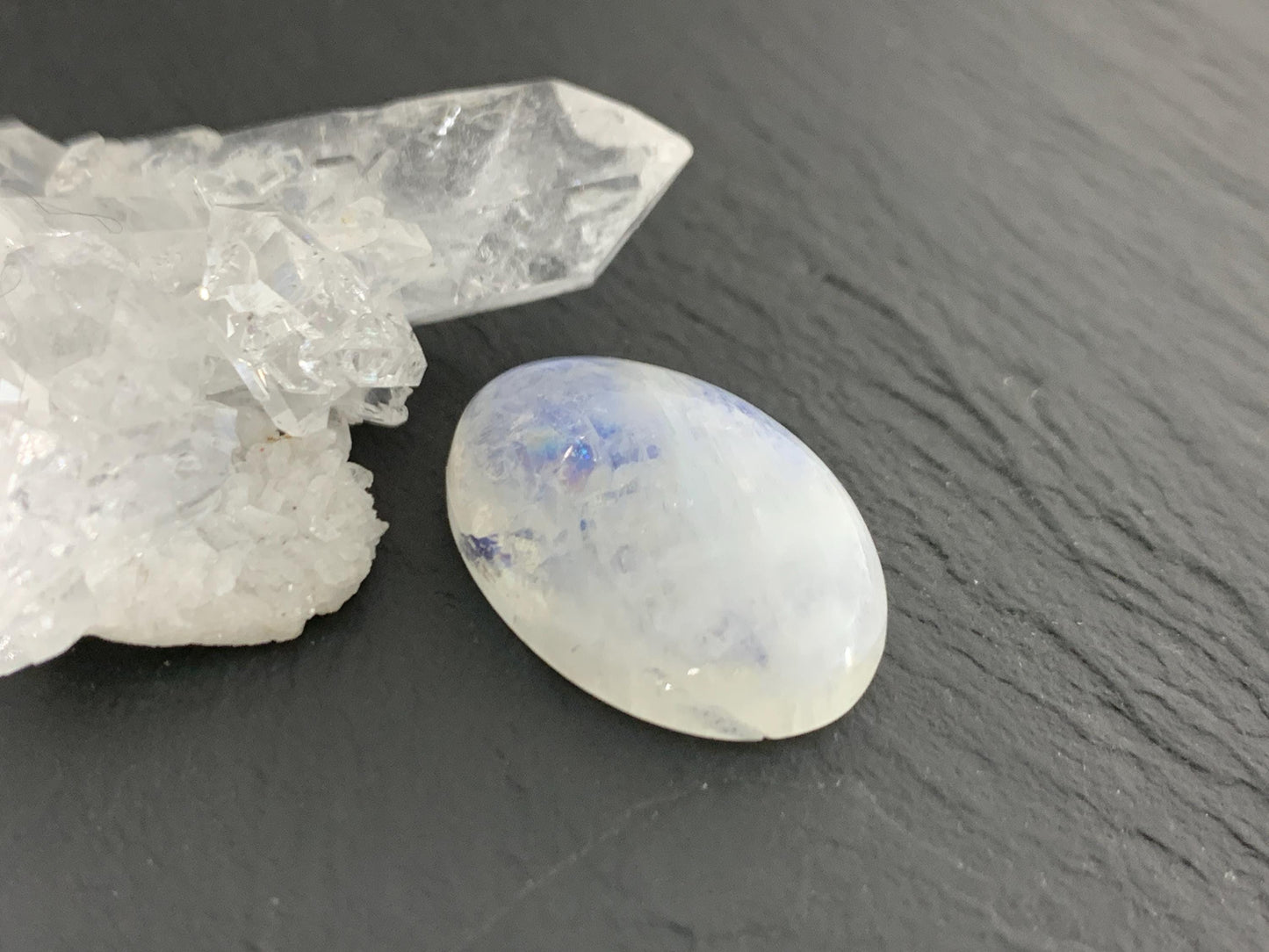 Rainbow Moonstone oval 21x15x6mm cabochon