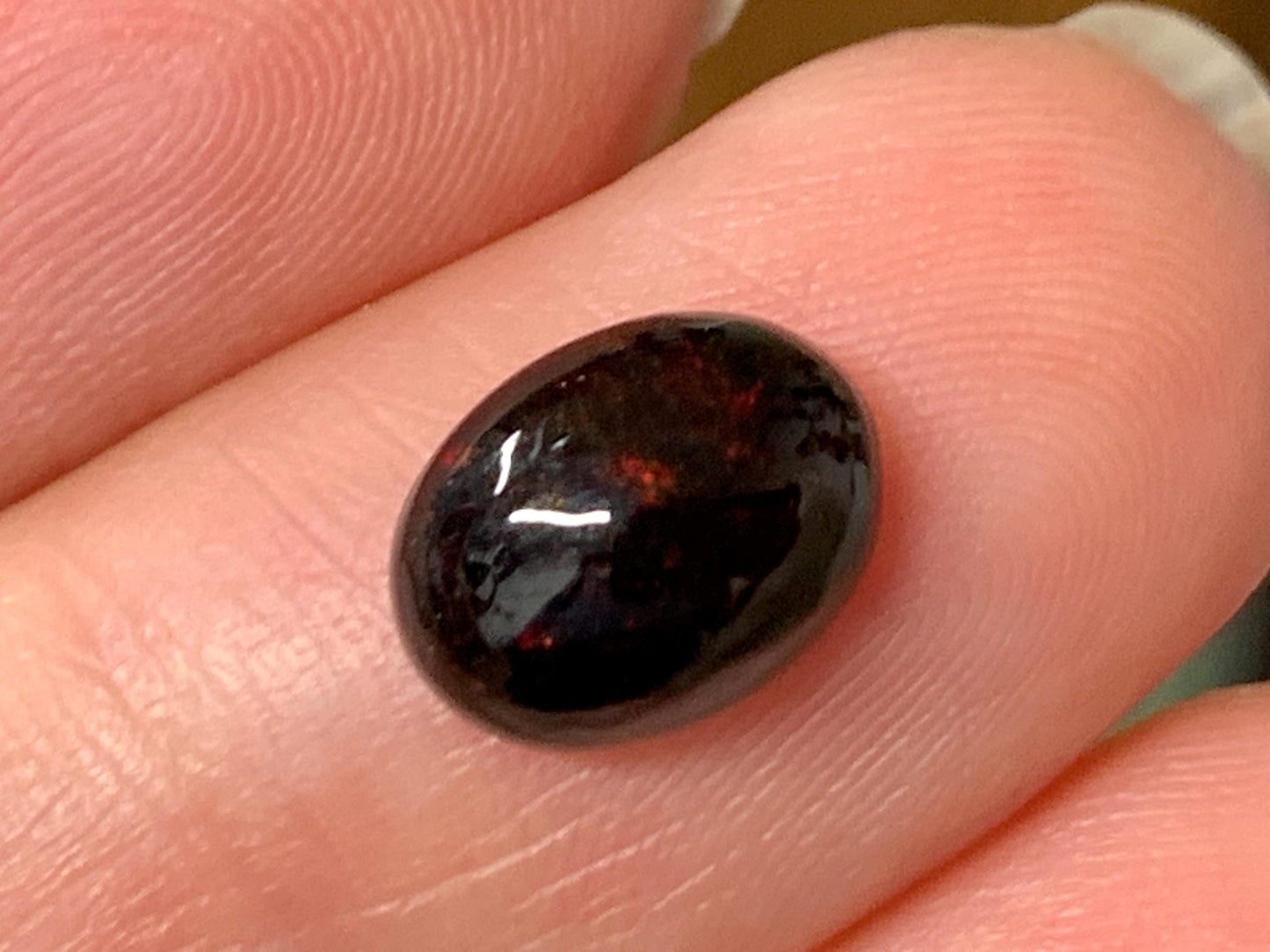 Natural Ethiopian Black Opal 7x9x4mm cabochon