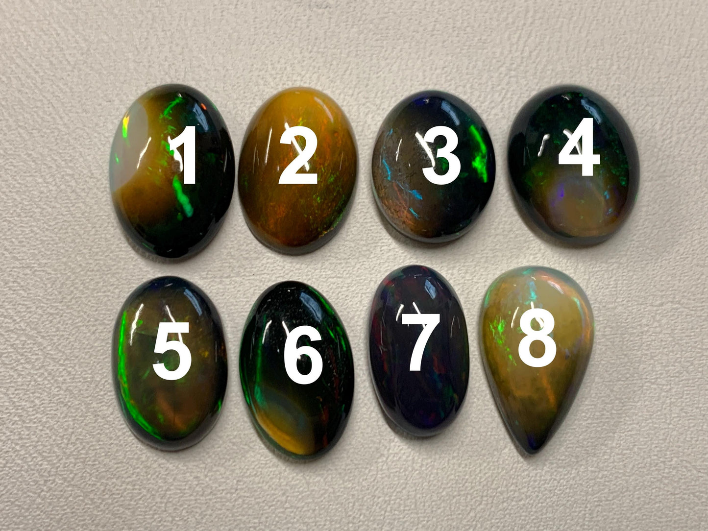 Natural Ethiopian Black Opal oval, pear 13-15mm long cabochon