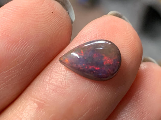Natural Ethiopian Black Opal 7x11x3mm cabochon