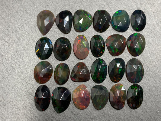 Faceted Black Ethiopian Opal 10-13mm long cabochon