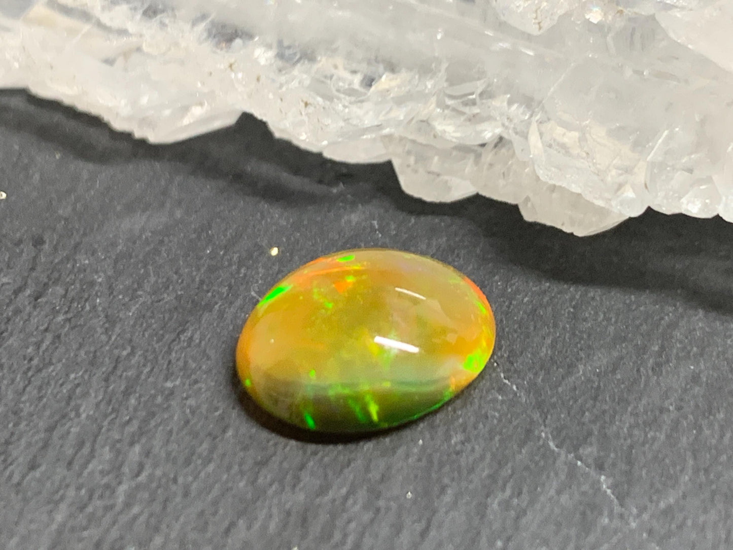 Natural Black Ethiopian Opal oval 9x11x4mm cabochon