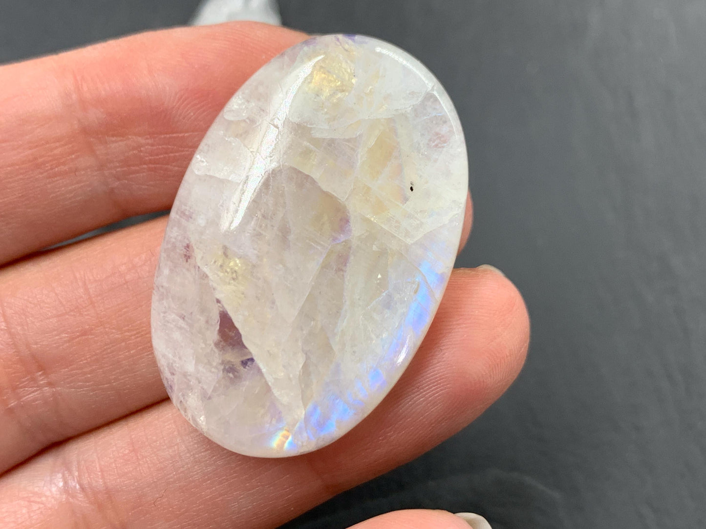 Rainbow Moonstone oval 38x25x7mm cabochon