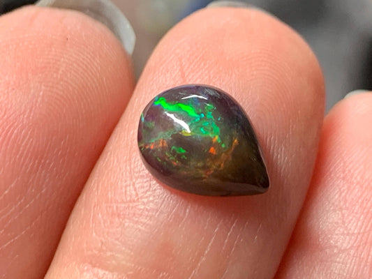 Natural Ethiopian Black Opal 8x10x4mm cabochon