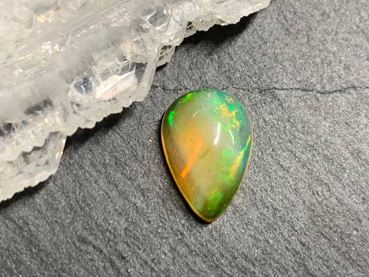 Natural Black Ethiopian Opal pear 8x11x5mm cabochon