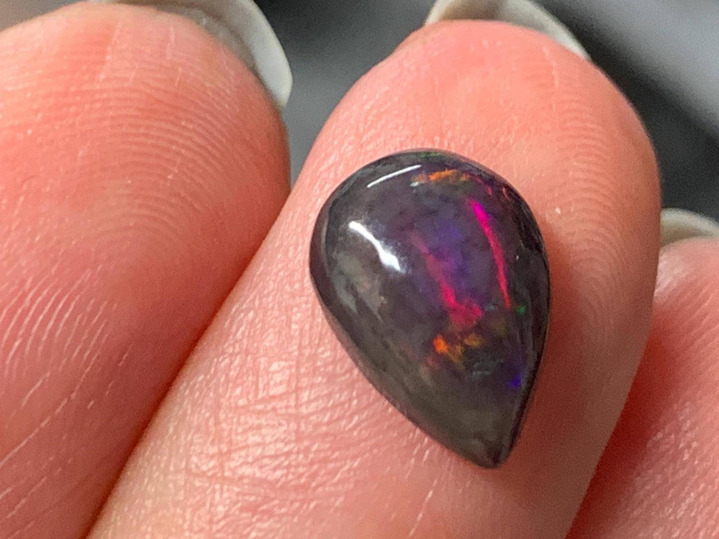 Natural Ethiopian Black Opal 7x11x4mm cabochon