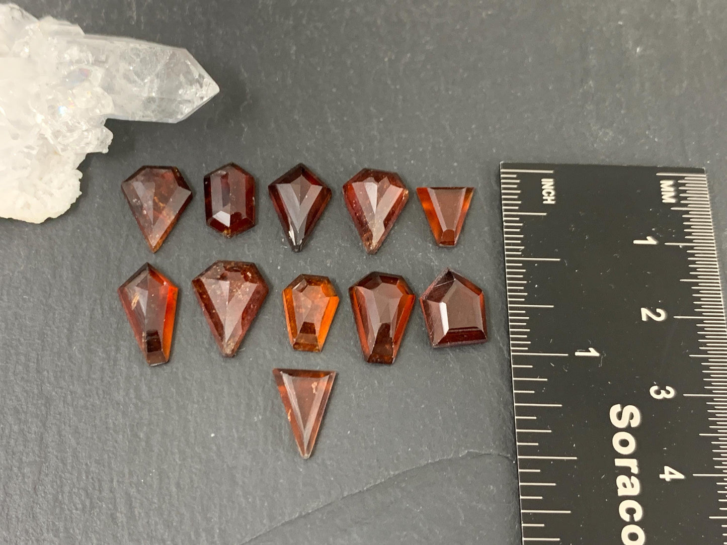 Faceted Hessonite Garnet 9-12mm long cabochon.
