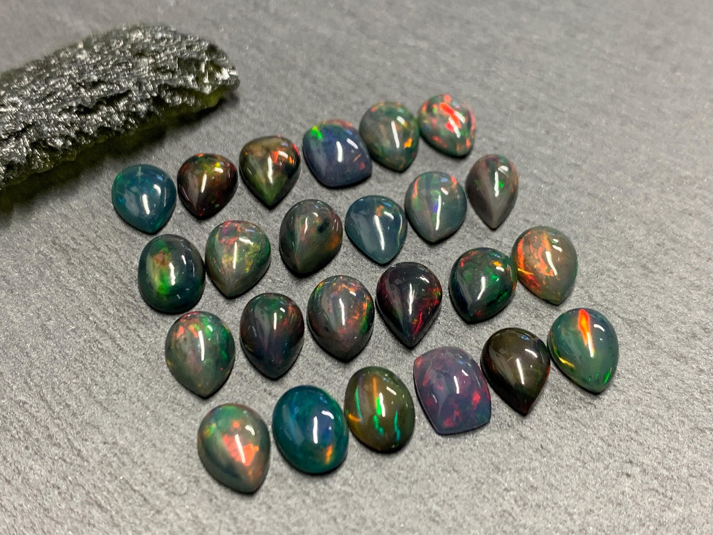 Black Ethiopian Opal pear, rectangle 6x8mm cabochon