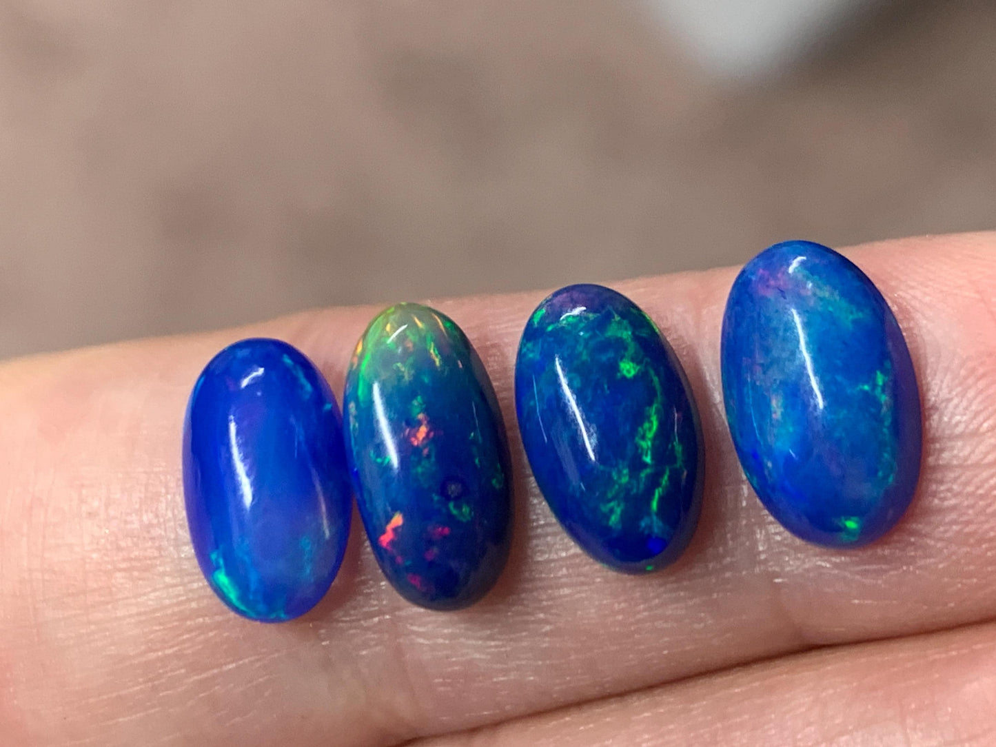 Ethiopian Opal oval 11-12mm long cabochon - Natural Opal smoked to blue color