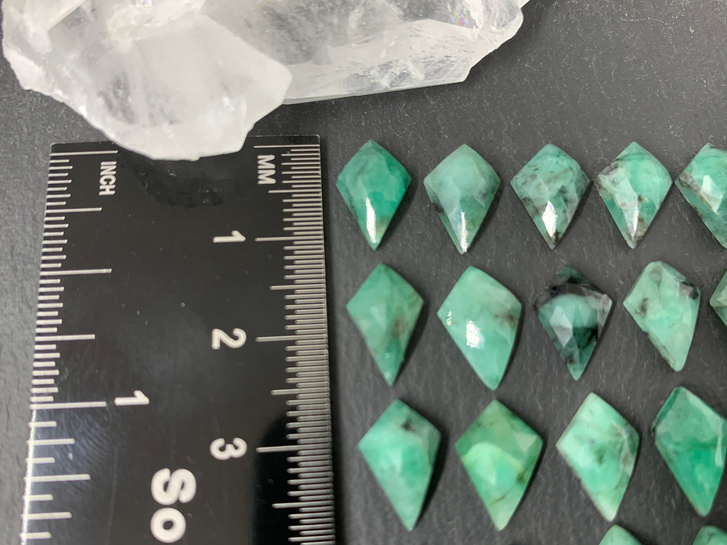 Faceted Emerald rhombus 8x12mm cabochon