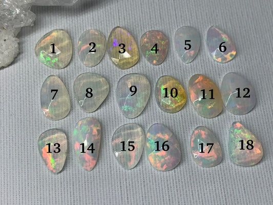 Faceted Ethiopian Opal 8-11mm long cabochon