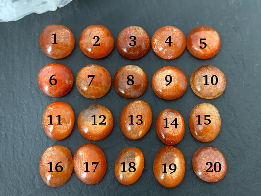 Sunstone round, oval 9-10mm long cabochon