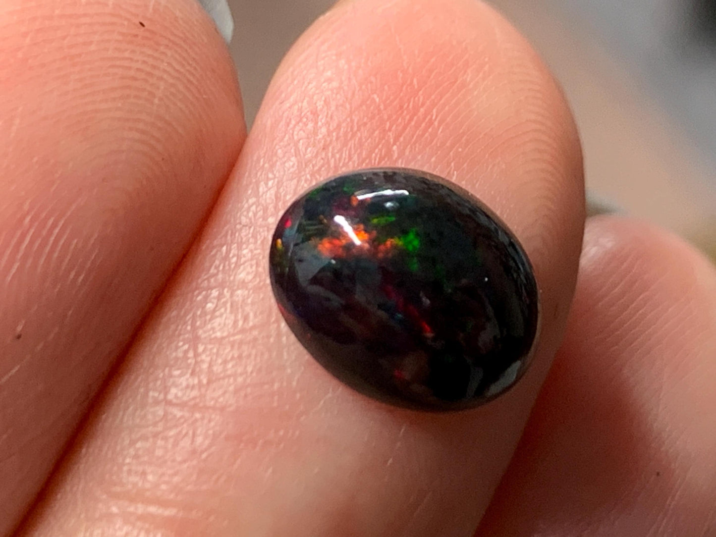 Natural Ethiopian Black Opal 8x10x4mm cabochon