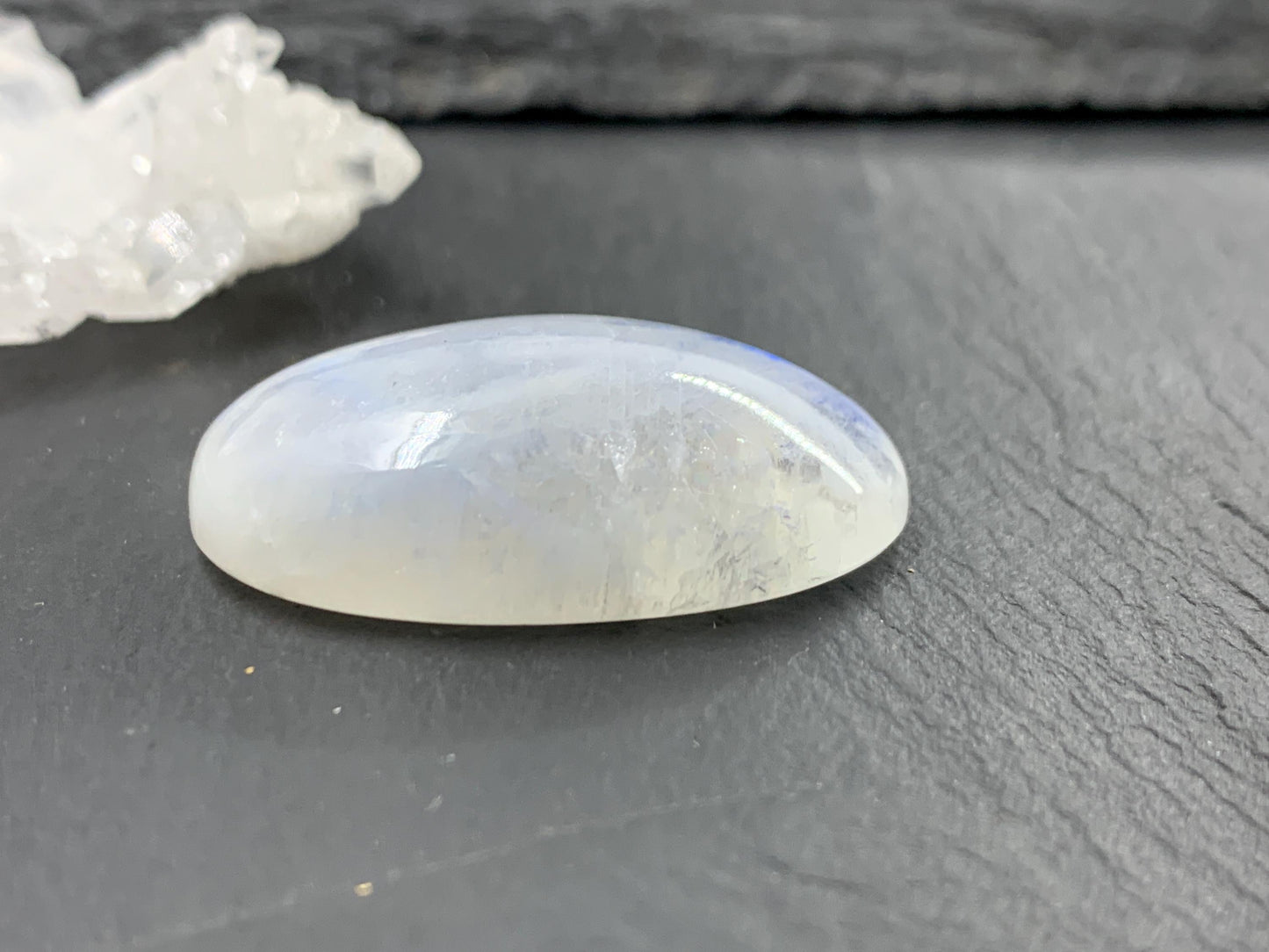 Rainbow Moonstone oval 33x21x9mm cabochon