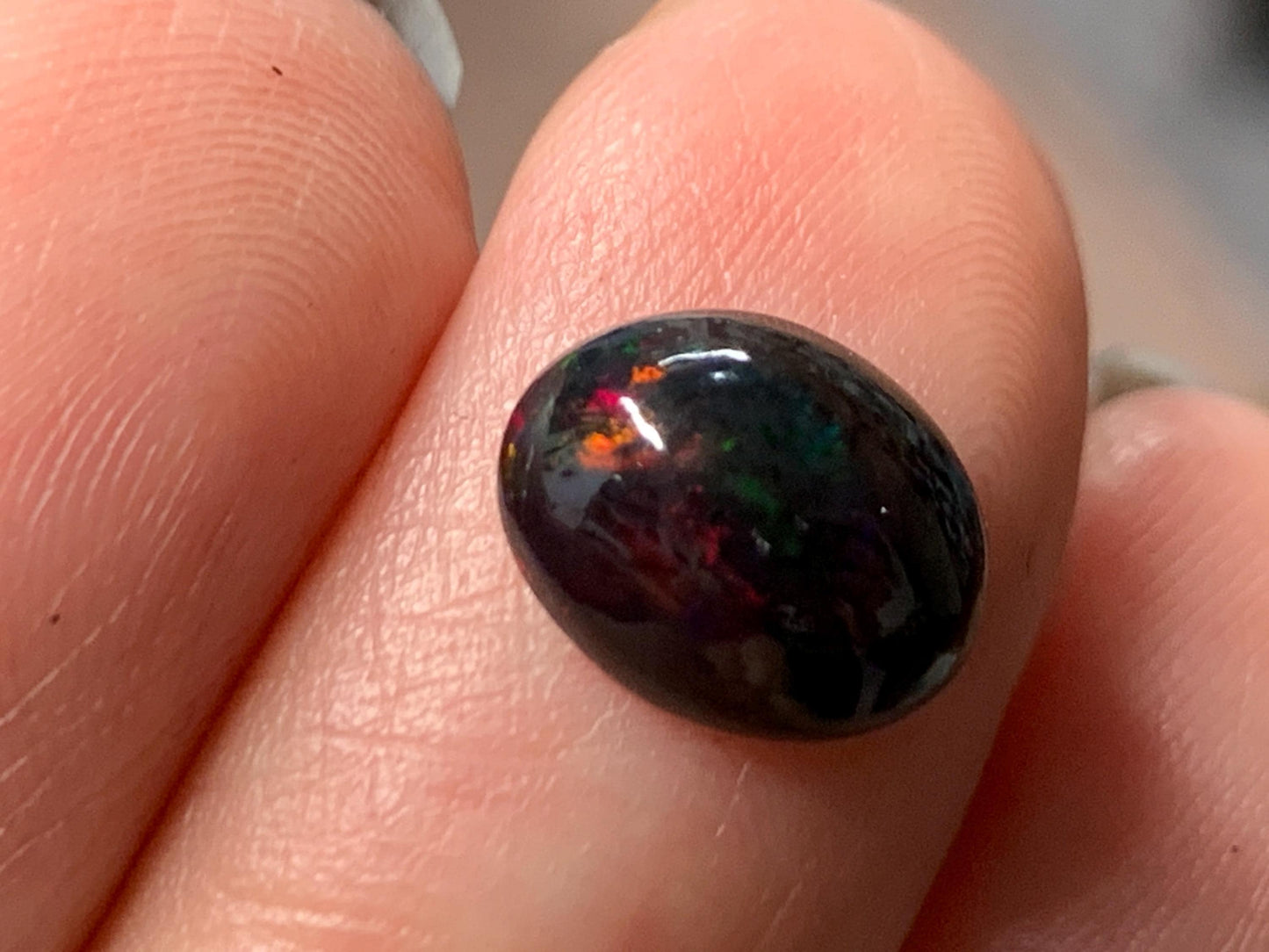 Natural Ethiopian Black Opal 8x10x4mm cabochon