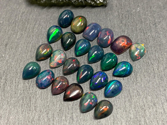 Black Ethiopian Opal 6x8mm cabochon