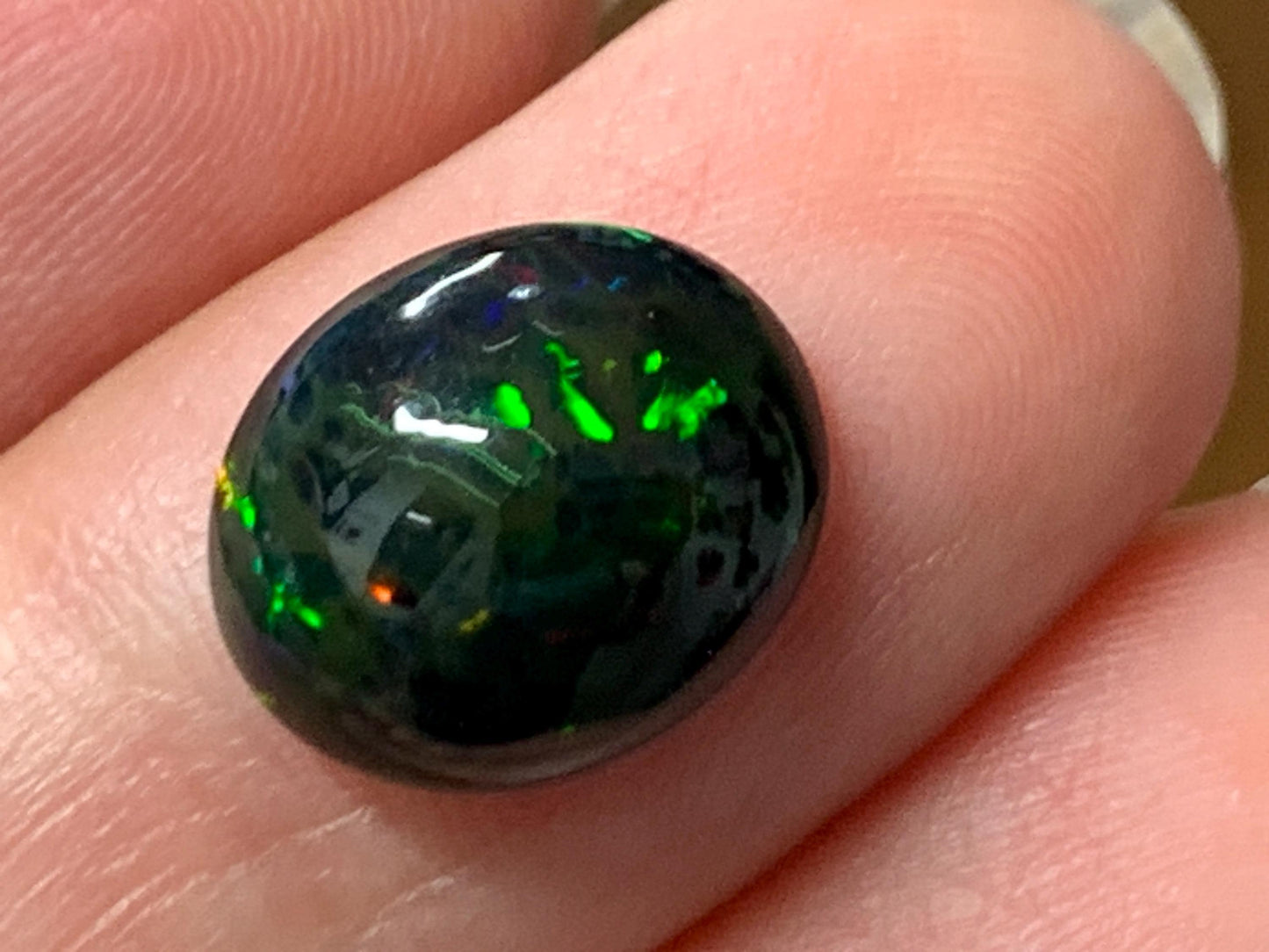 Natural Ethiopian Black Opal 10x12x4.5mm cabochon