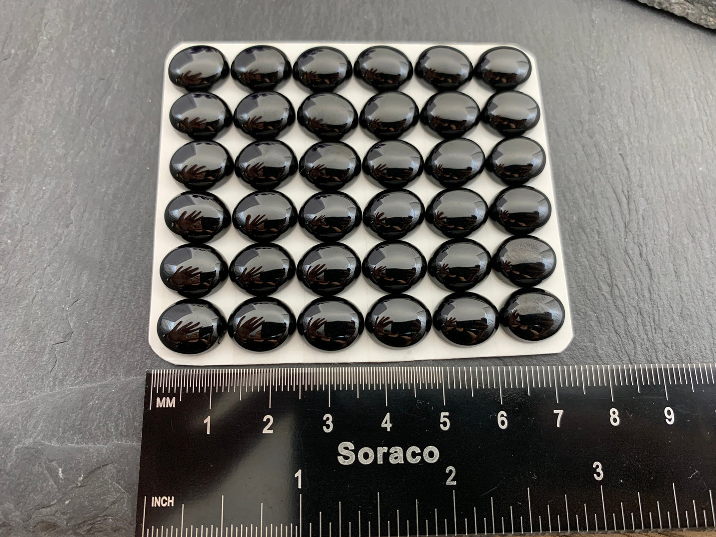 Black Spinel oval 10x12mm cabochon - Calibrated cabochons