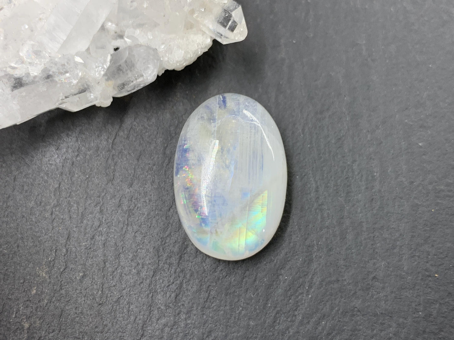 Rainbow Moonstone oval 19x13x7mm cabochon