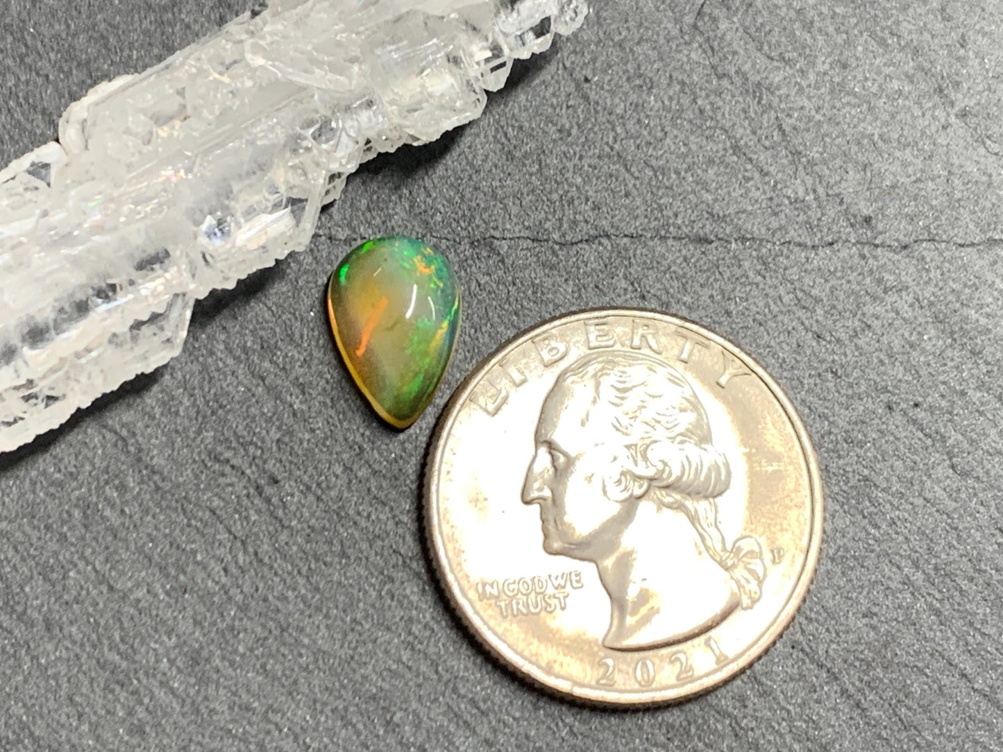 Natural Black Ethiopian Opal pear 8x11x5mm cabochon