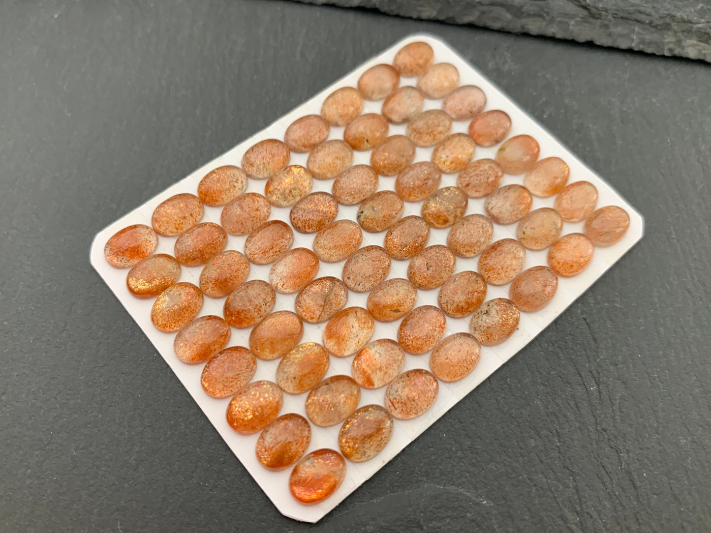 Sunstone oval 6x8mm cabochon