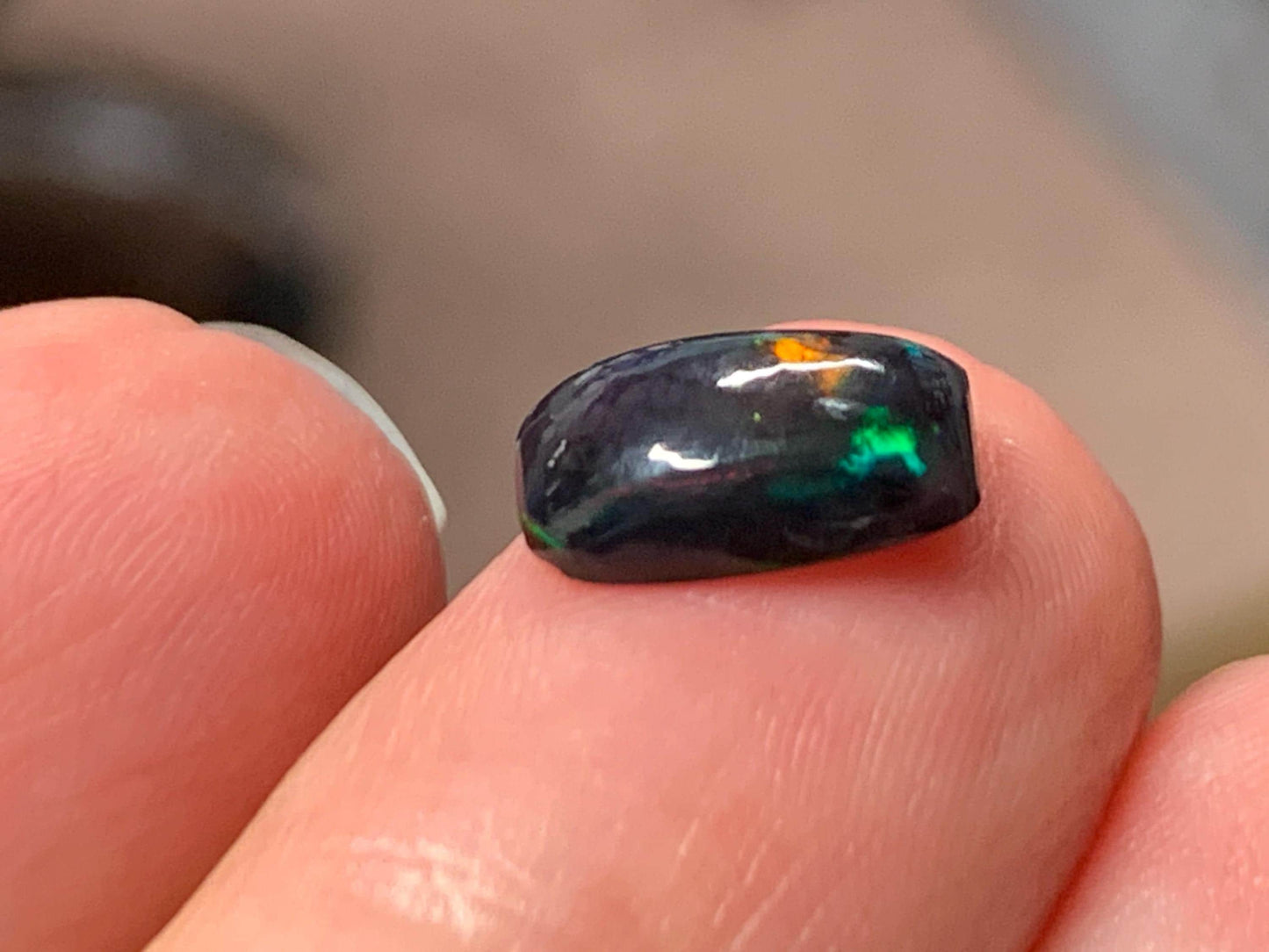 Natural Ethiopian Black Opal 6x10x3mm cabochon