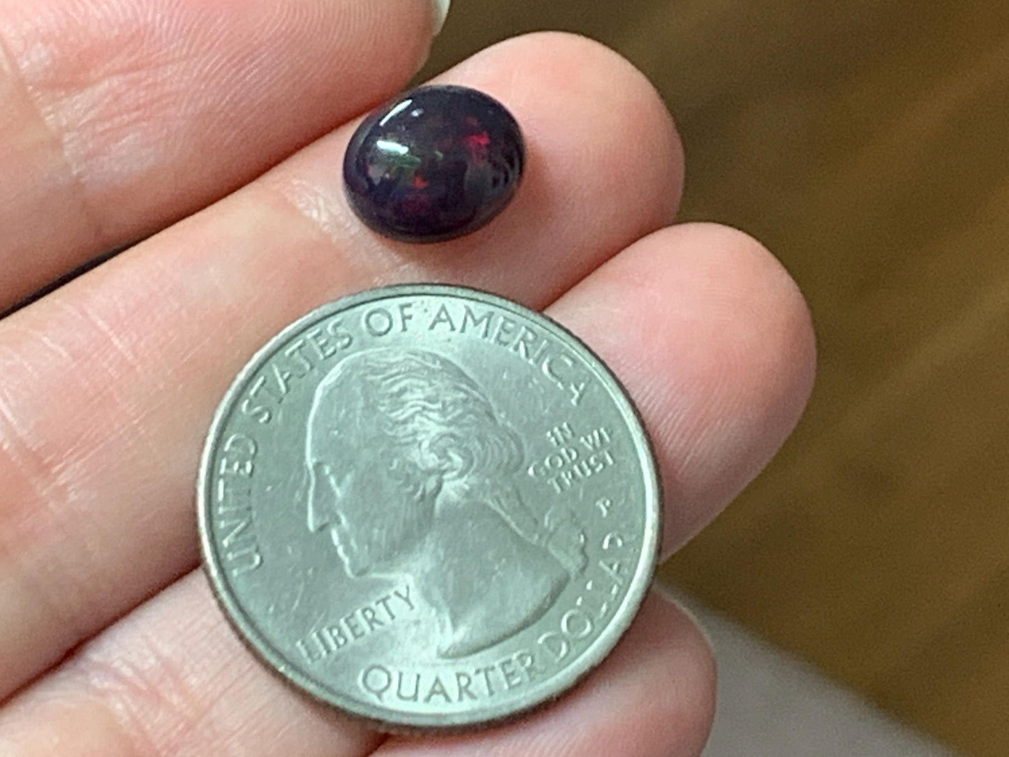 Natural Ethiopian Black Opal 8x10x5mm cabochon