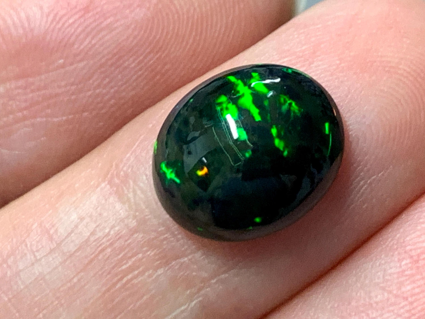 Natural Ethiopian Black Opal 10x12x4.5mm cabochon