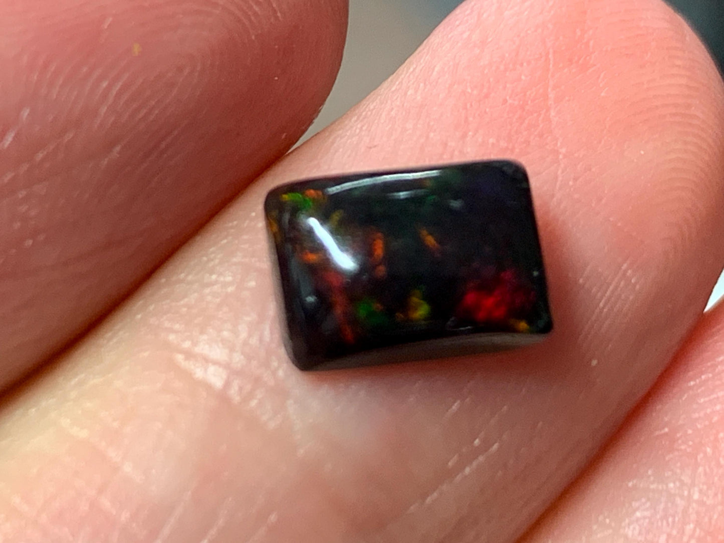 Natural Ethiopian Black Opal 6x8x3mm cabochon