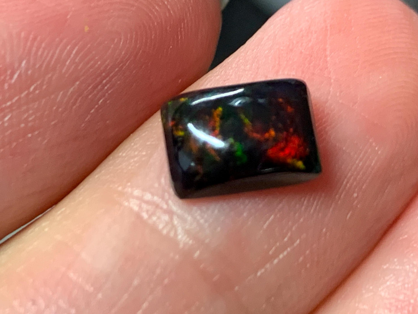 Natural Ethiopian Black Opal 6x8x3mm cabochon