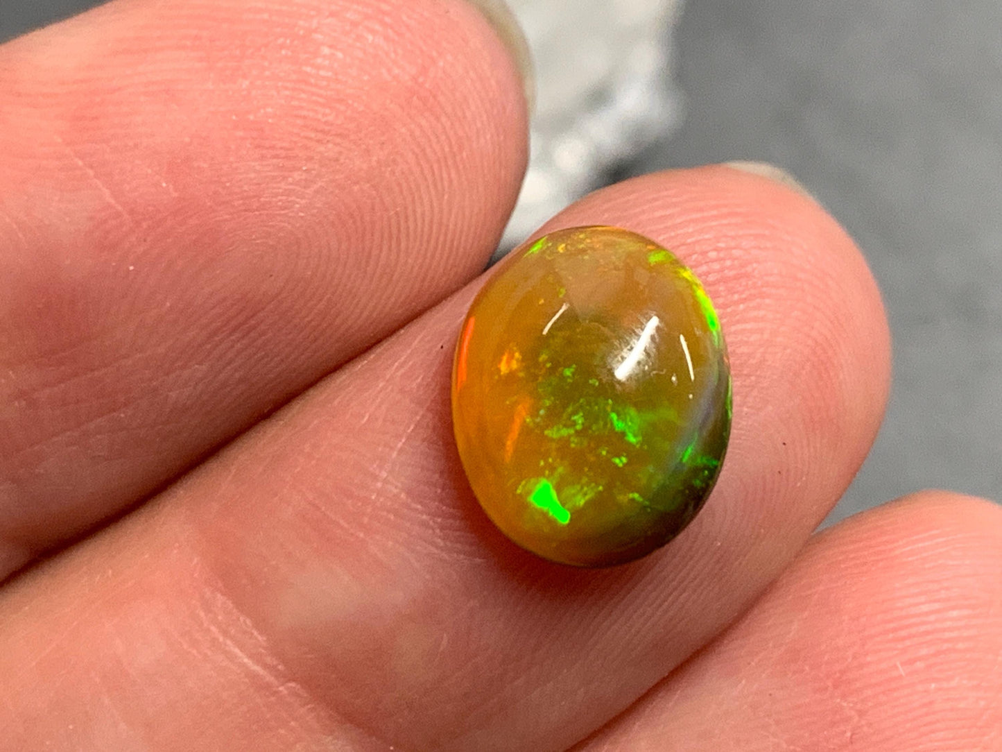 Natural Black Ethiopian Opal oval 9x11x4mm cabochon