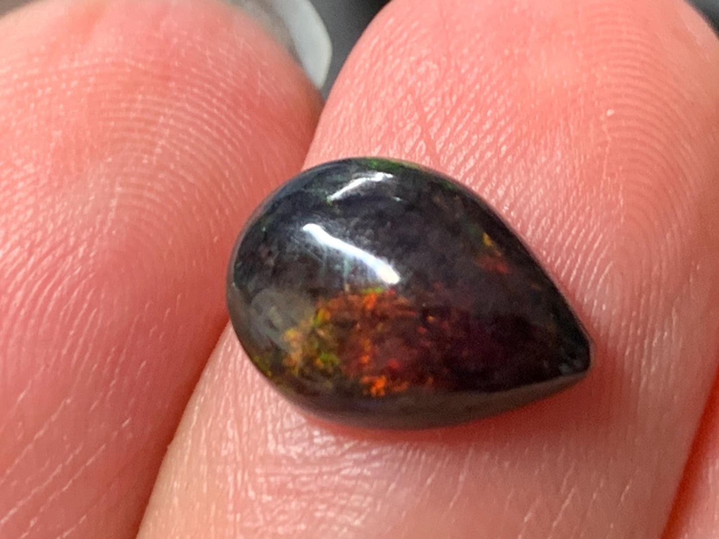Natural Ethiopian Black Opal 8x11x4mm cabochon