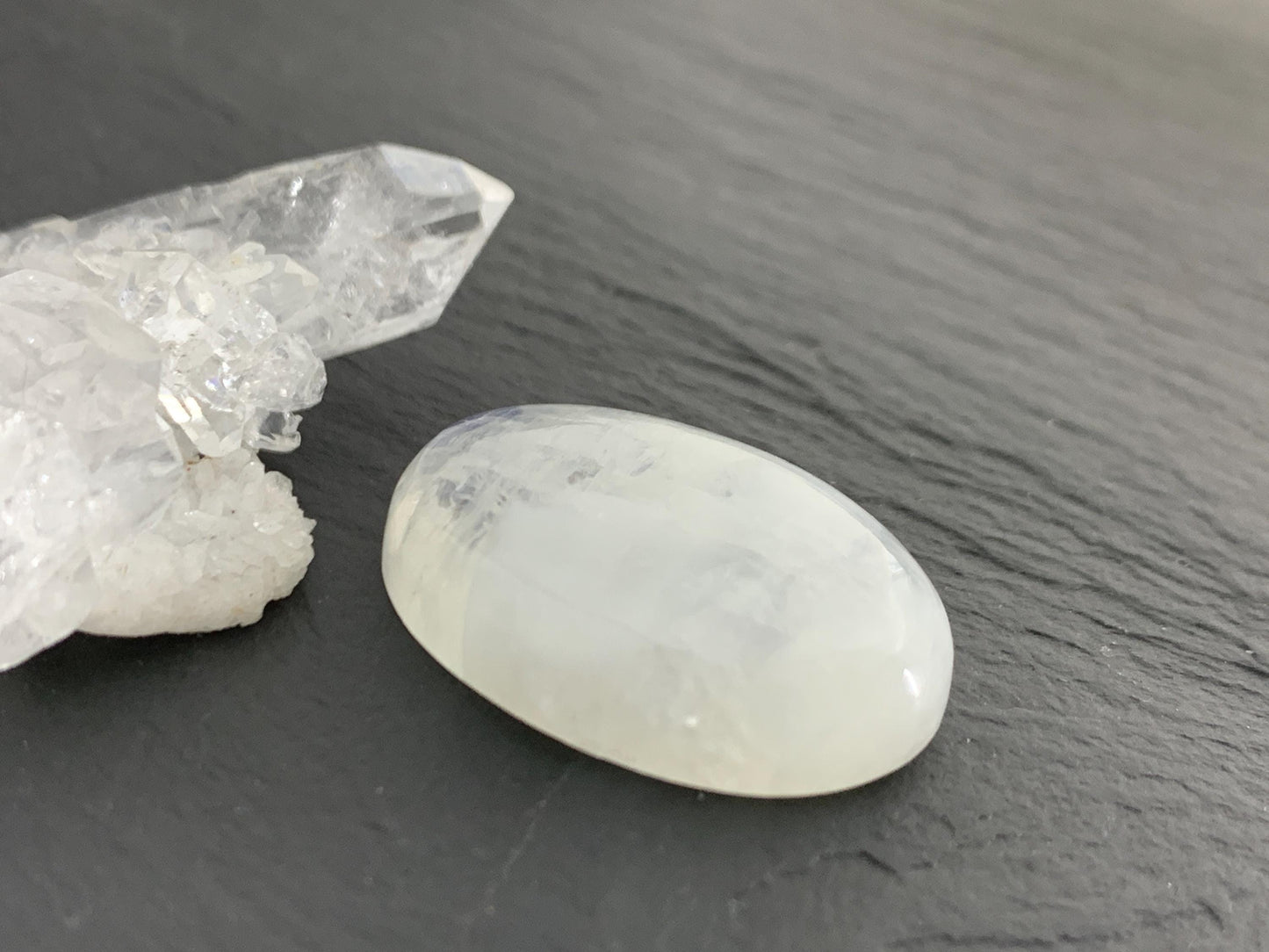 Rainbow Moonstone oval 26x19x7mm cabochon