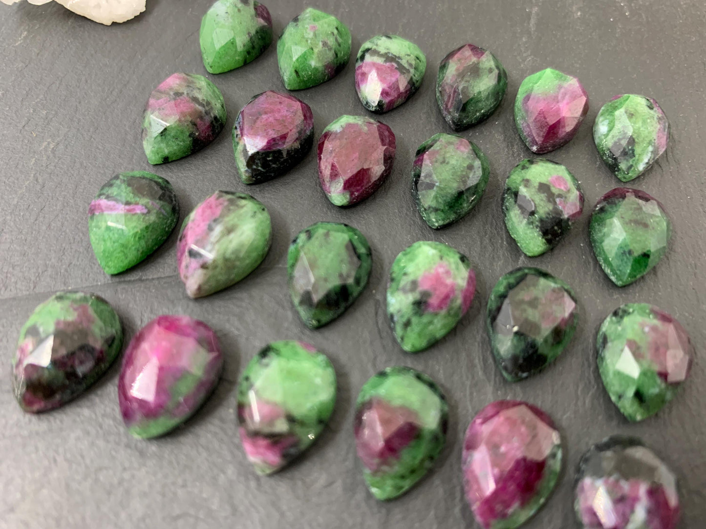 Faceted Ruby Zoisite pear 10x14mm cabochon