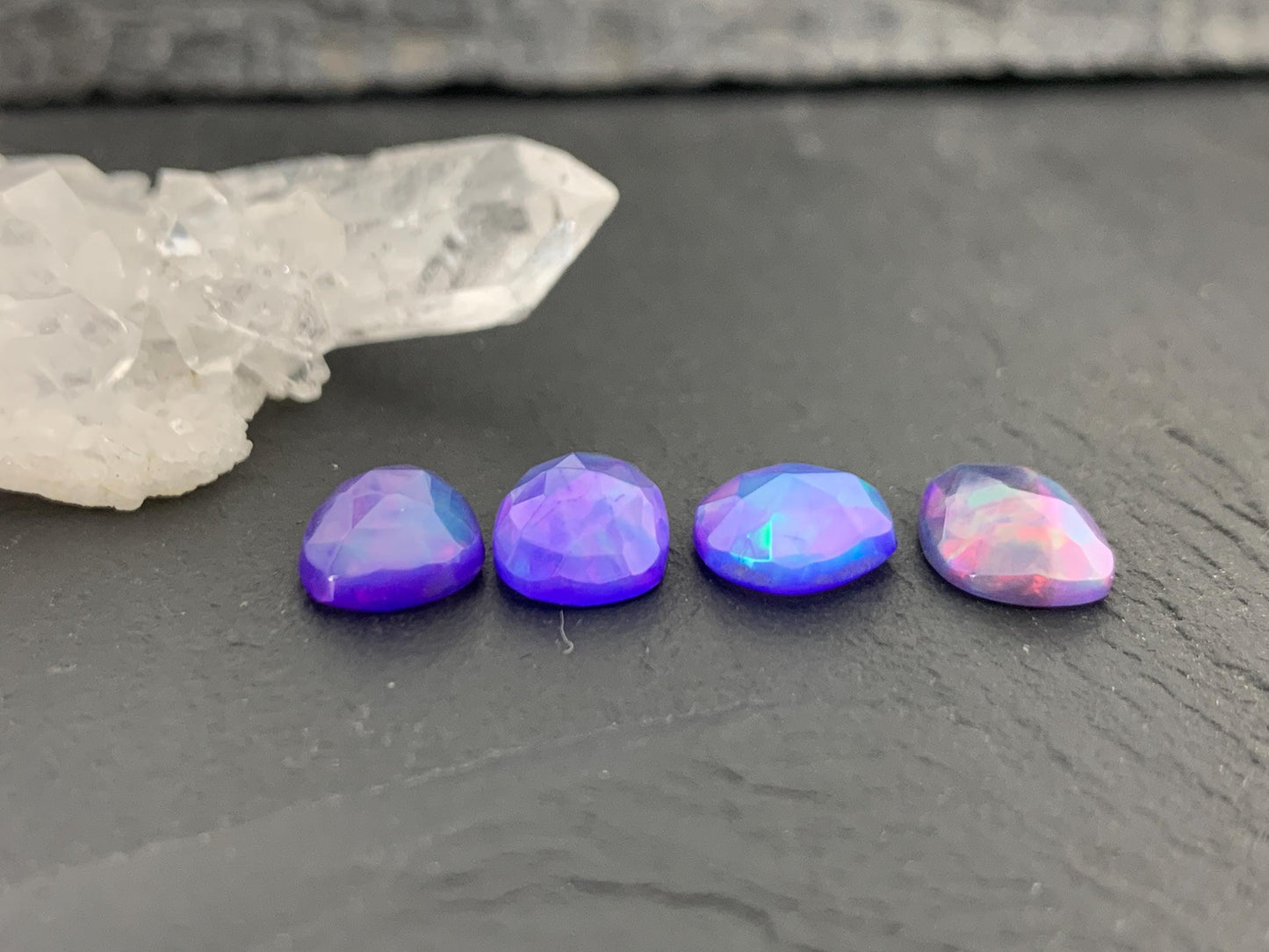 Faceted Ethiopian Purple Opal 9-11mm cabochon