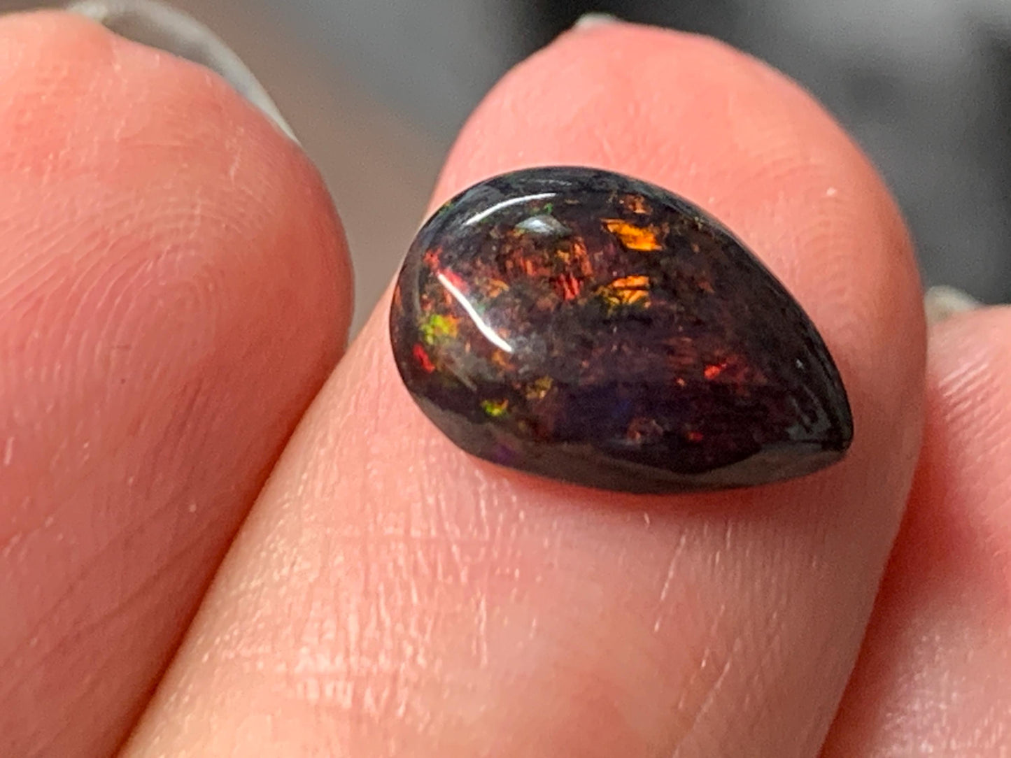 Natural Ethiopian Black Opal 8x11x4mm cabochon