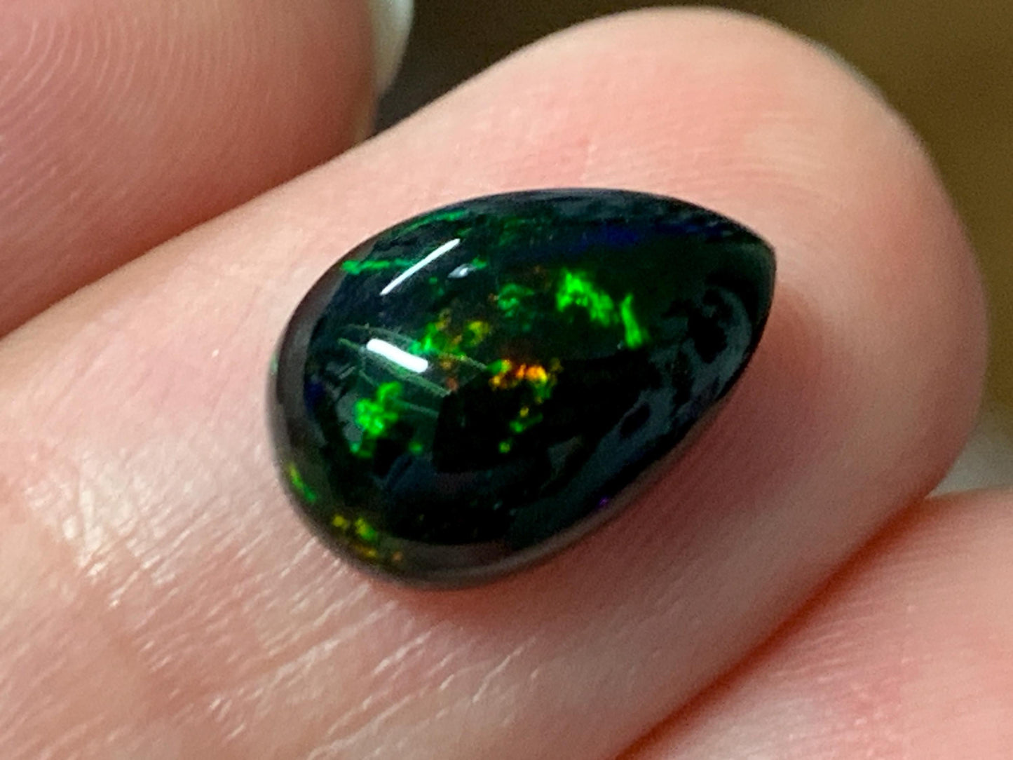 Natural Ethiopian Black Opal 8x12x4mm cabochon