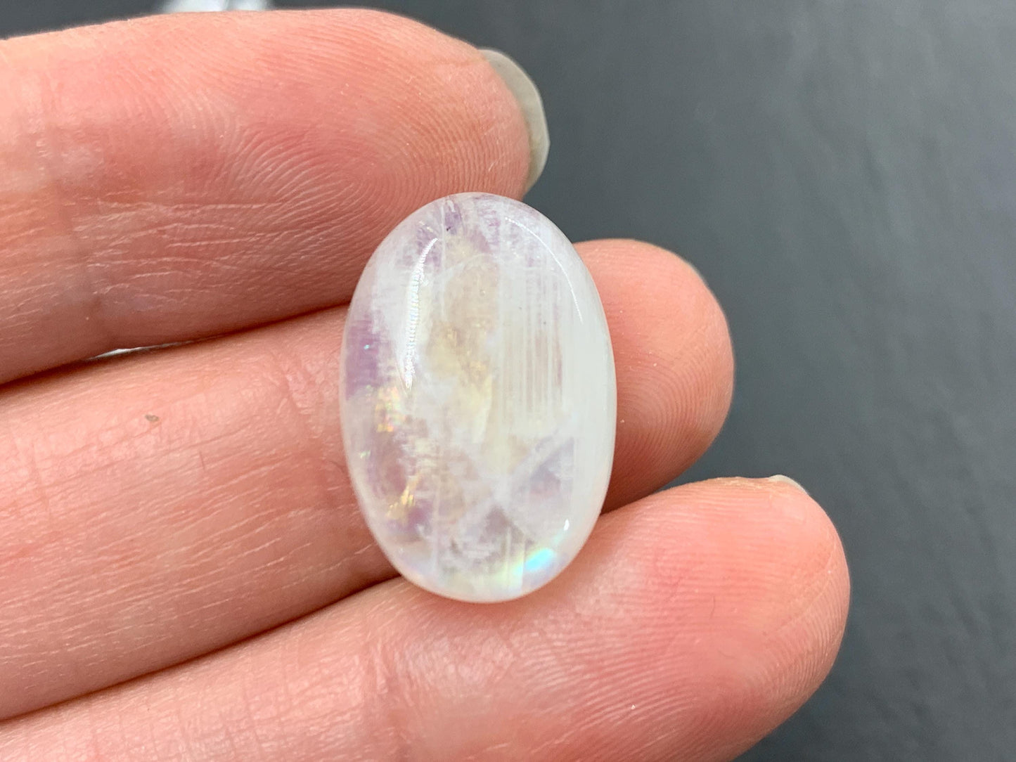 Rainbow Moonstone oval 19x13x7mm cabochon