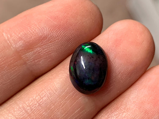 Black Ethiopian Opal oval 9x12x4mm cabochon