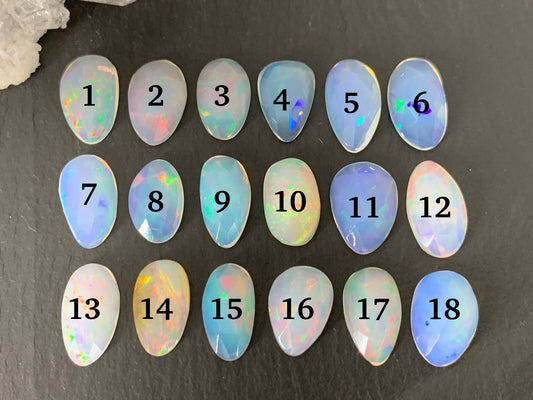 Faceted Ethiopian Opal oval 13mm cabochon