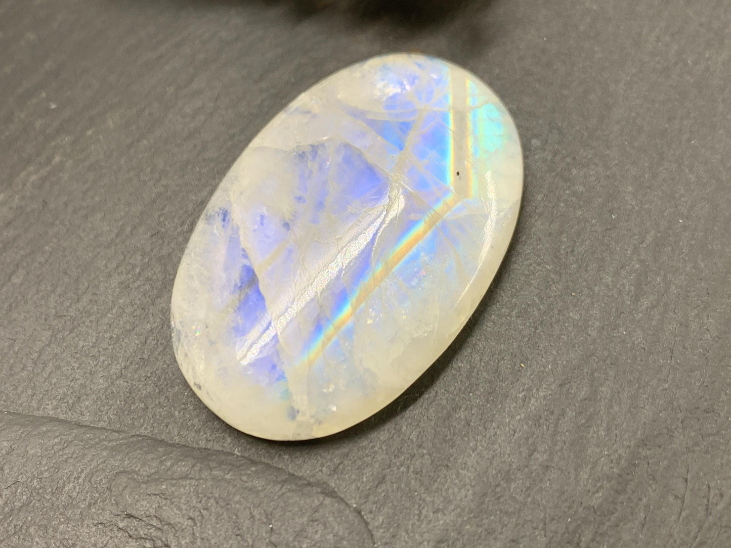 Rainbow Moonstone oval 38x25x7mm cabochon